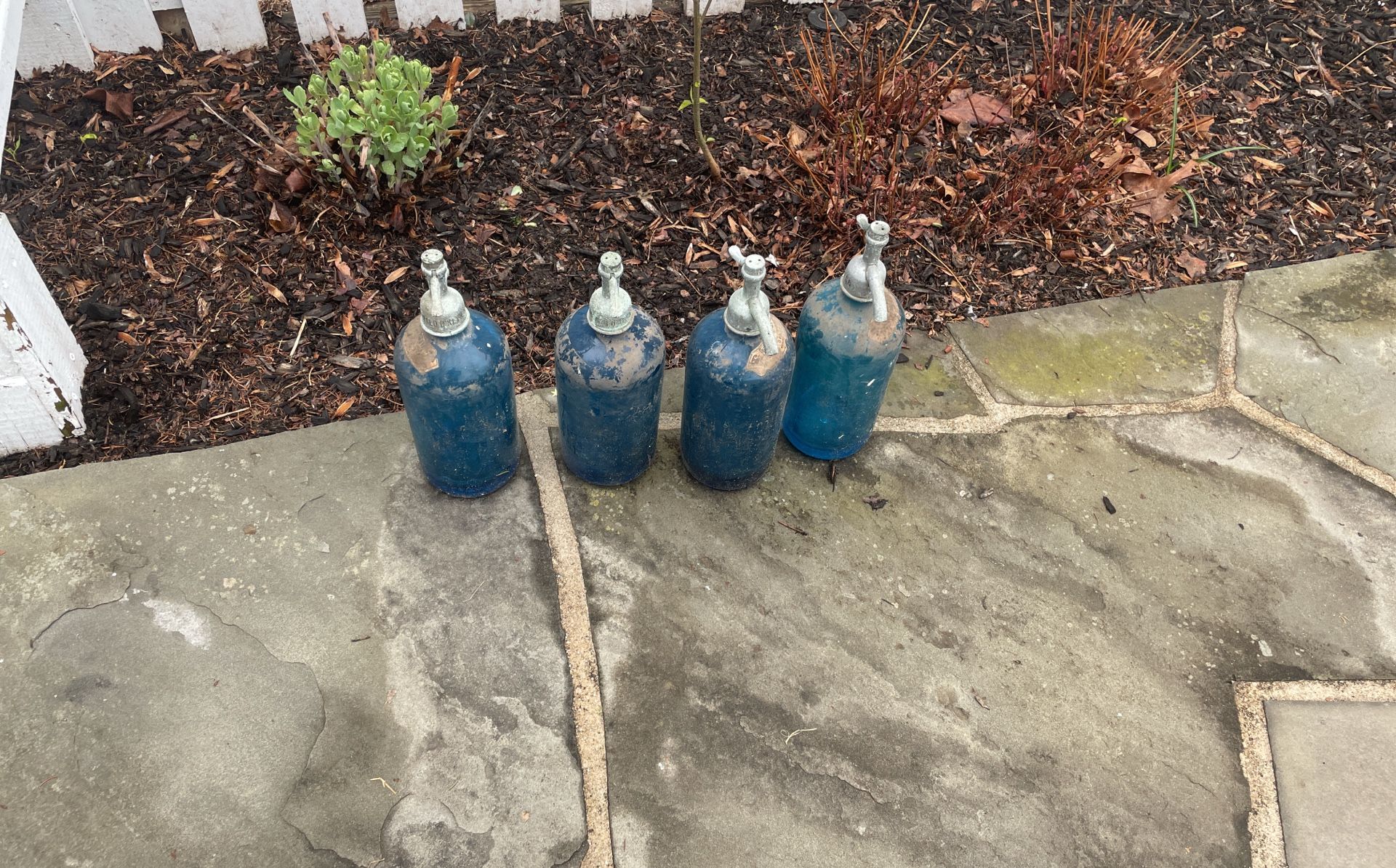 Four Antique Blue Glass Seltzer Bottles