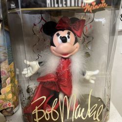 Bob Mackie Limited Edition Millennium Minnie Mouse doll. This collectible doll was produced in 1999 to celebrate the new century.  The doll measures a