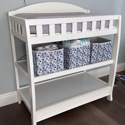 Changing table + changing pad