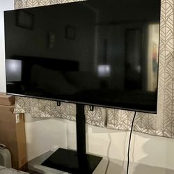 55’ UHD 4K TV & Stand/Mount