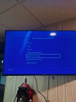 PS4 with controllers and games