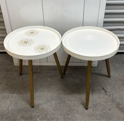 Two small white tables w/ golden legs