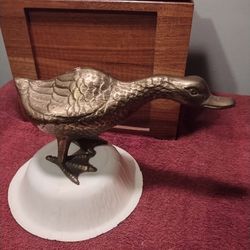 Brass duck figurine