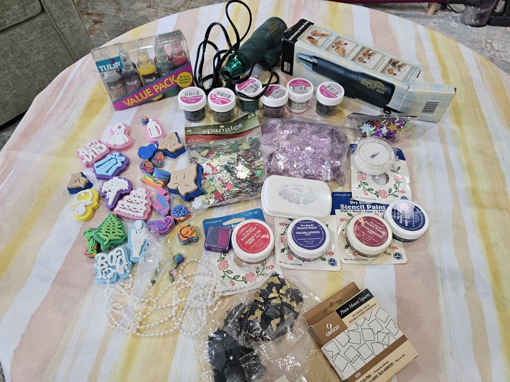 Never used arts and crafts, scrap booking, embossing and fabric paint.