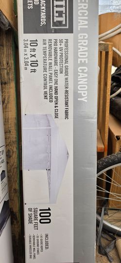 Everbilt 10x10 canopy. New  with back wall