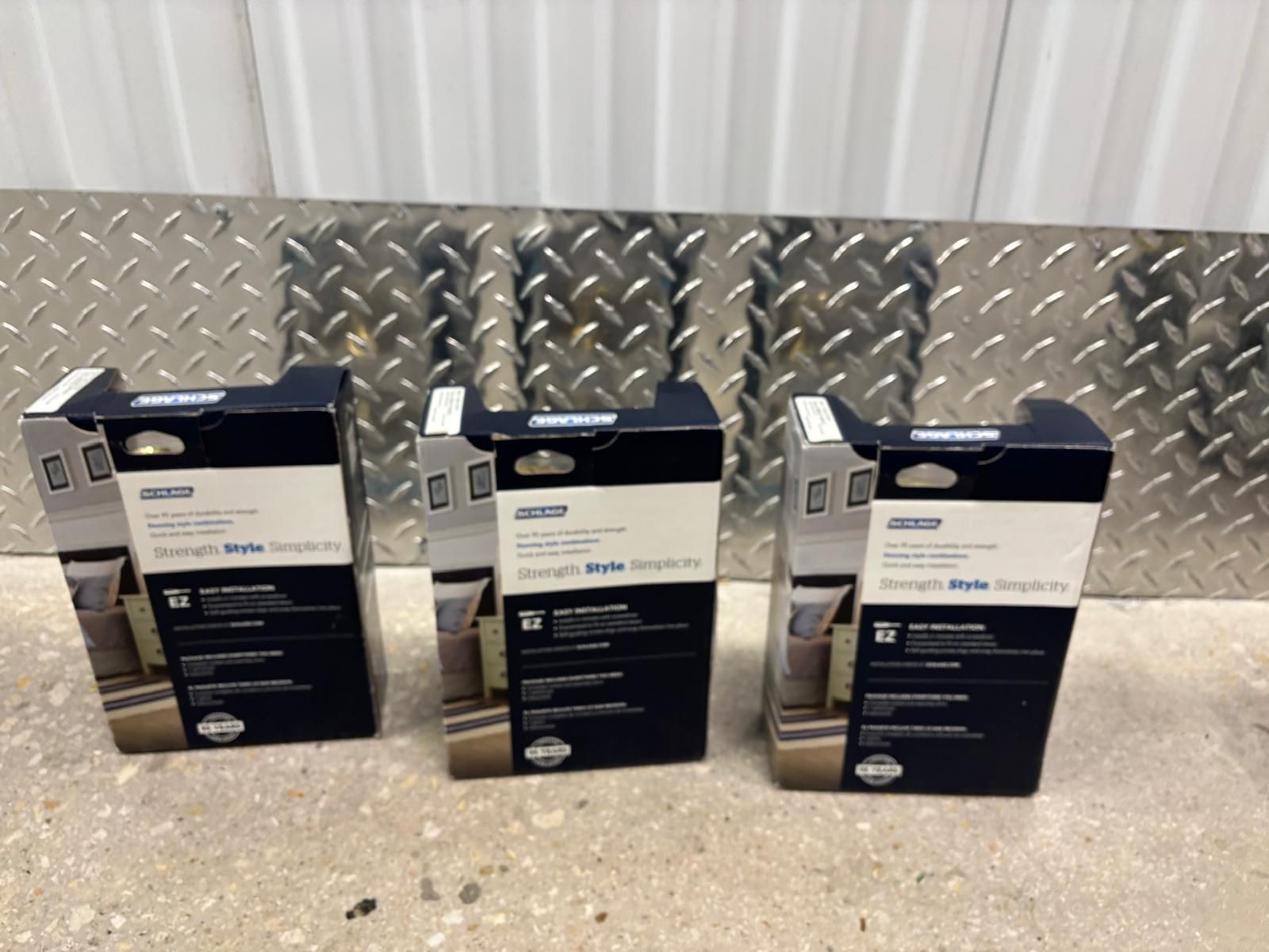 Three Schlage Bed & Bath privacy door lever, specifically the Flair style, in a bright brass finish.  $10 each