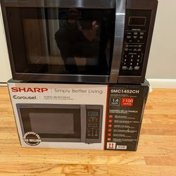Sharp 1.4 cu. Ft 1100 watt black microwave
