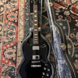 Epiphone SG “Vintage” Model With Original Hardshell Case.