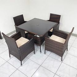 $250 (New in box) 5pcs wicker dining set indoor outdoor patio furniture 35x35” glass table w/ umbrella cutout, 4 chairs 