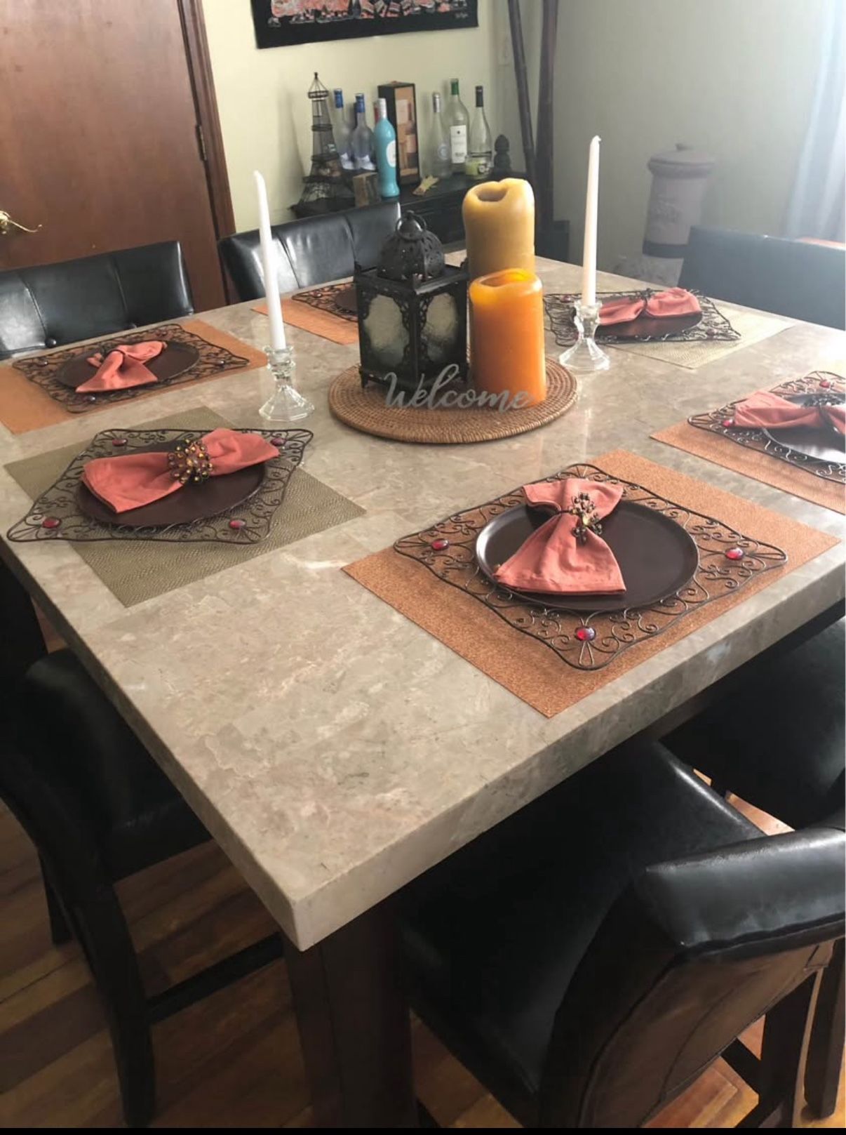Pub Style Granite Table, Light In Color With 6 Black Leather Chairs