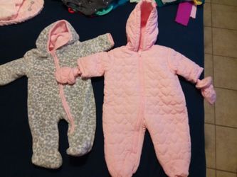 Baby girls coats ( pink one it's new without tags) ( 0-3 months)