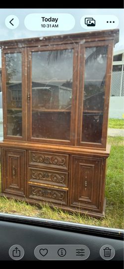 Two furniture pieces Free. One china Cabinet and entertainment center or for bedroom