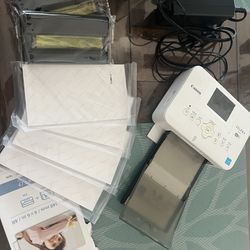 Canon Selphy CP910 Printer, ink And Paper bundle