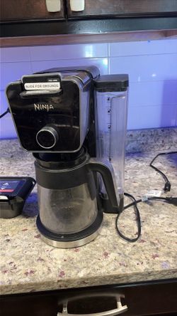 Coffee maker with frother