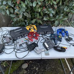 2 Nintendo 64 consoles and 5 controllers and other Nintendo items
