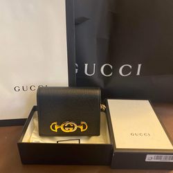 gucci wallet on chain 