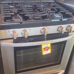 Bonita estufa de gas con garantía