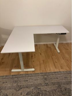 White Office L-Desk 24” deep, 55” x 63”, 29” tall