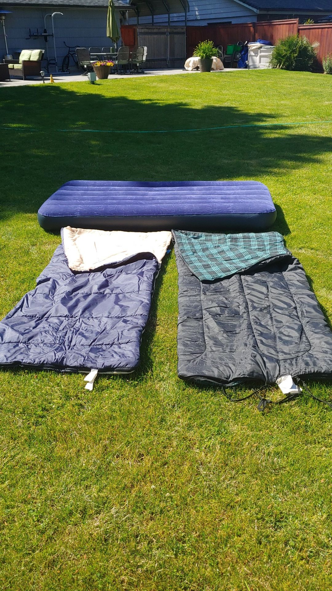 Two sleeping bags and one twin size air mattress