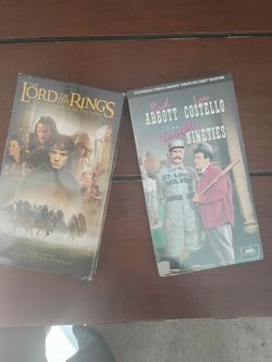 2 unopened sealed VHS tapes of Lord of the rings and Abbott and Costello