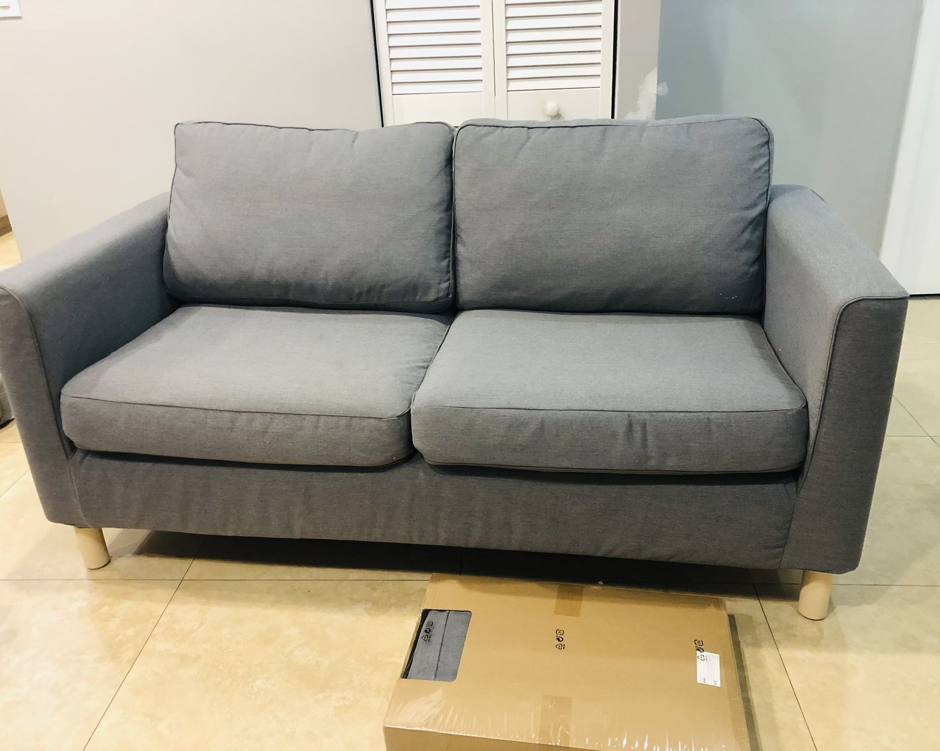 New Ikea Loveseat with extra covered
