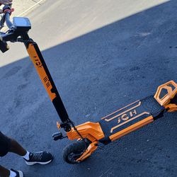 JGH Electric Scooter. 32 Mph! Rapid Charging