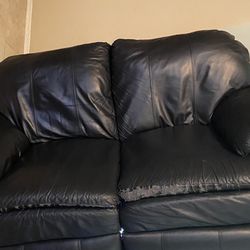 Black Leather Reclining Love Seat