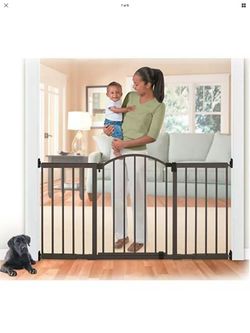 New baby gate opening up to 72 inches wide 36 inches high.
