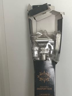Adjustable drapery rod