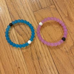 Blue & purple Lokai bracelets