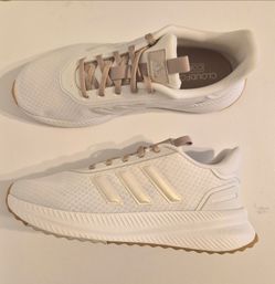 Brand new Adidas 10.5 Women's