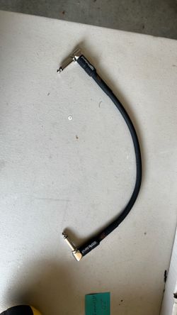 This is a Roland RIC-BPC Black Series patch cable with right-angle connectors