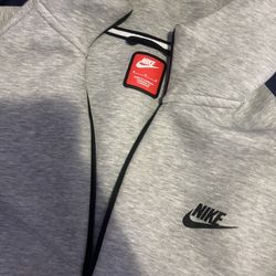 grey nike tech