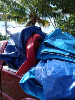 Three bounce houses with blowers
