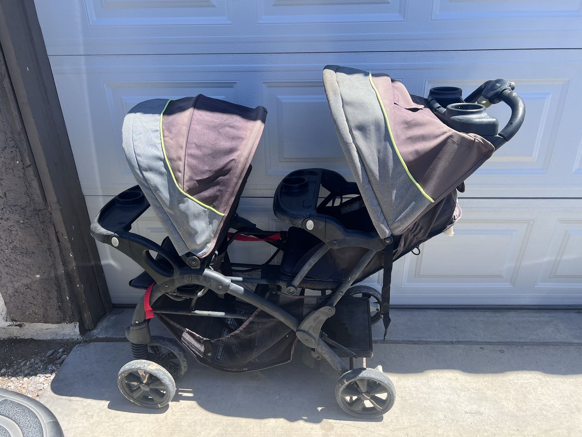 Double Sit In Stand Stroller 