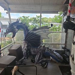 Huge dragon works with fogging machine and he also roars fog machine