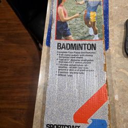 Sportcraft Badminton Set.  Complete 4 Player Set With  Poles, Net, Paddles And Shuttlecocks.  Never Opened.  Box Is Worn.