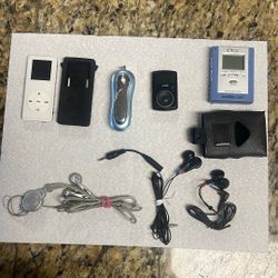 Total Of 4  MP 3 Audio Players From The 90s And 3 Original Head Phones