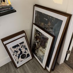 An Assortment of Tempered Glass Walnut Frames
