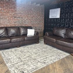 Free Delivery-Ashley brown leather sofa/couch + loveseat
