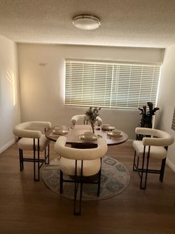 55 Inc Oval Wood Dinning table /4 Sets of 24” Counter Stool