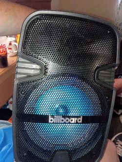 Fm and Bluetooth speaker with power cord mic adjusting volume and echo