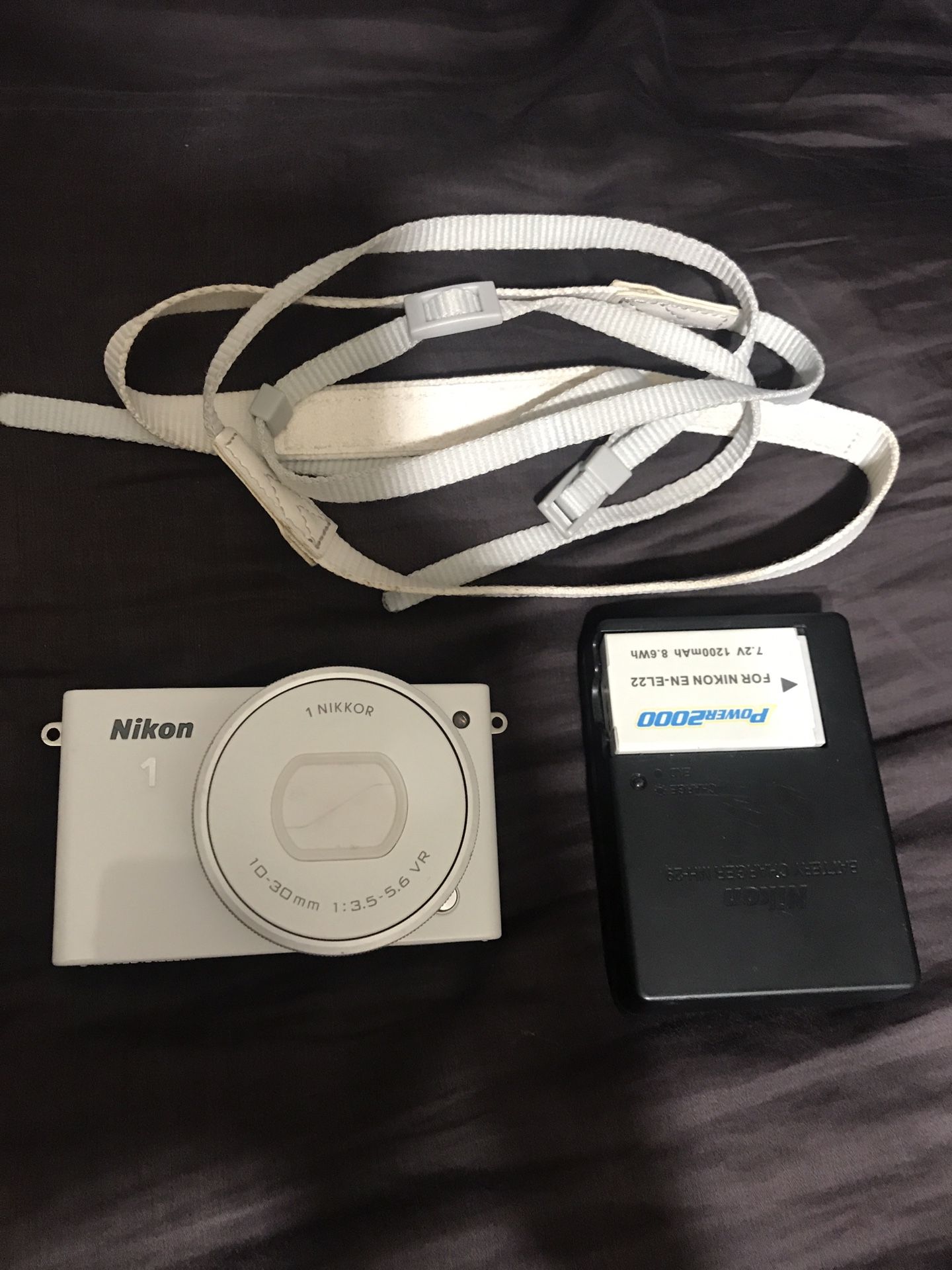 Nikon 1 J4 Digital Camera with extra Battery Charger and SD Card