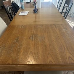 Long Dining Room table with 4 fabric chairs