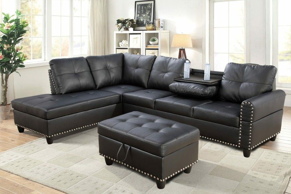 Brand New Black Leather Sectional With A Drop Down Table Built In Cup Holders & Storage Ottoman