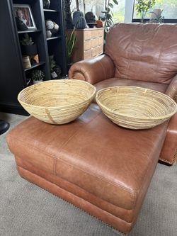 Two beautiful bamboo bowls, 16 inches wide. One is 6 inches tall and the other one is 7 inches.