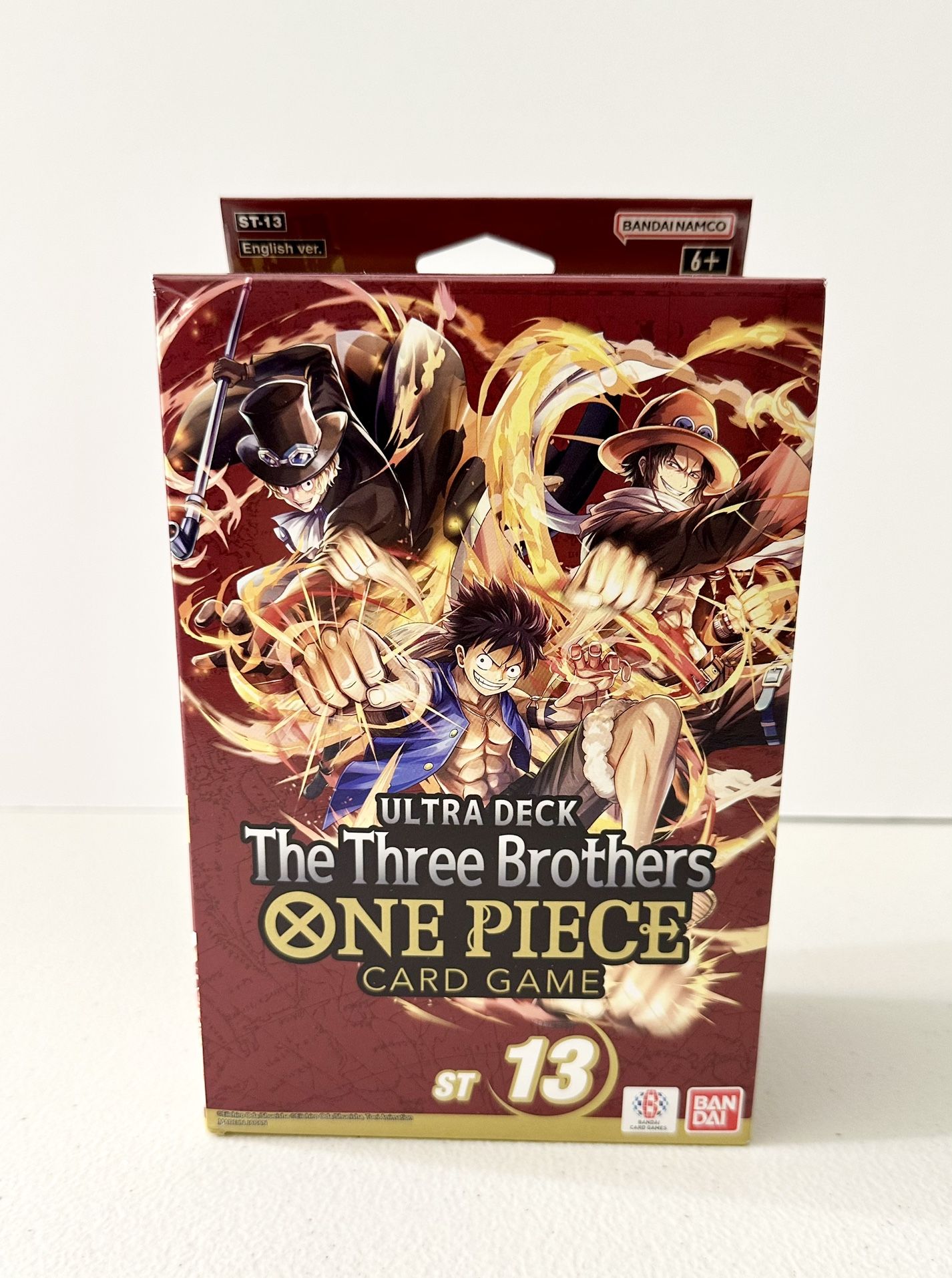 BRAND NEW SEALED. ONE PIECE CARD GAME: THE THREE BROTHERS ULTRA DECK BOX ST-13 FOR SALE. 