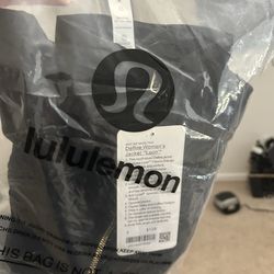 LULULEMON‼️ black and gold jacket size 2 brand new