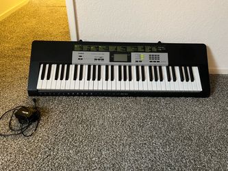 Casio LK-135 61-Key Lighted Keyboard with Power Adapter