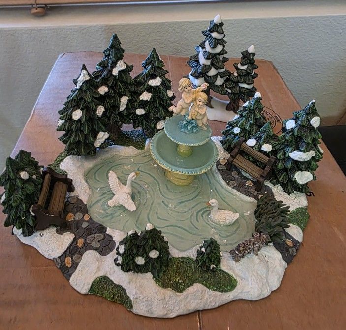 Village Old Towne Fountain And Trees